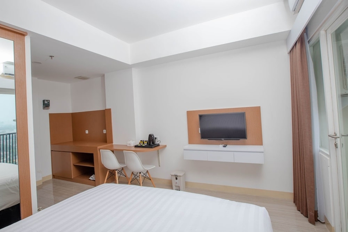 Imagen de la habitación del Hotel Urban Express Homtel Serpong. Foto 15