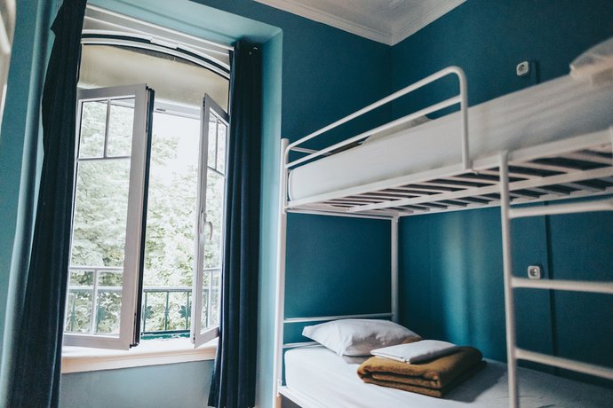 Imagen de la habitación del Hotel Urban Garden Hostel. Foto 12