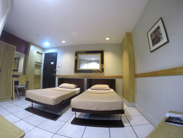 Imagen de la habitación del Hotel Urban Inn Iloilo. Foto 15