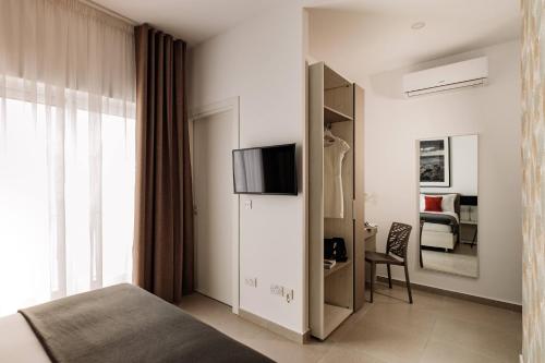 Imagen de la habitación del Hotel Urban Isle. Foto 14