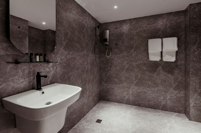 Imagen de la habitación del Hotel Urban Living Residence. Foto 19