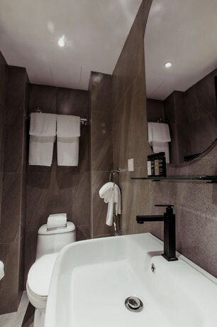 Imagen de la habitación del Hotel Urban Living Residence. Foto 21