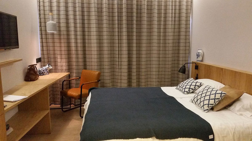 Imagen de la habitación del Hotel Urban Lodge. Foto 8