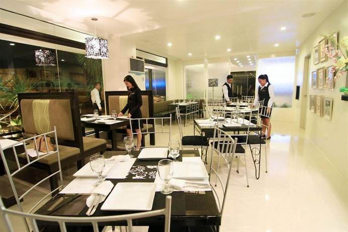 Imagen del bar/restaurante del Hotel Urban Manor. Foto 3