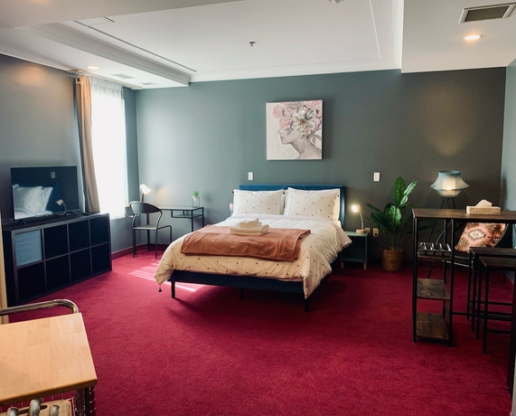 Imagen de la habitación del Hotel Urban Nest. Foto 14