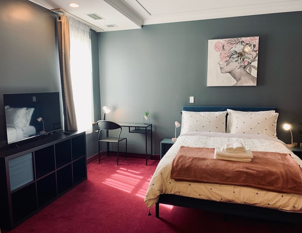 Imagen de la habitación del Hotel Urban Nest. Foto 15