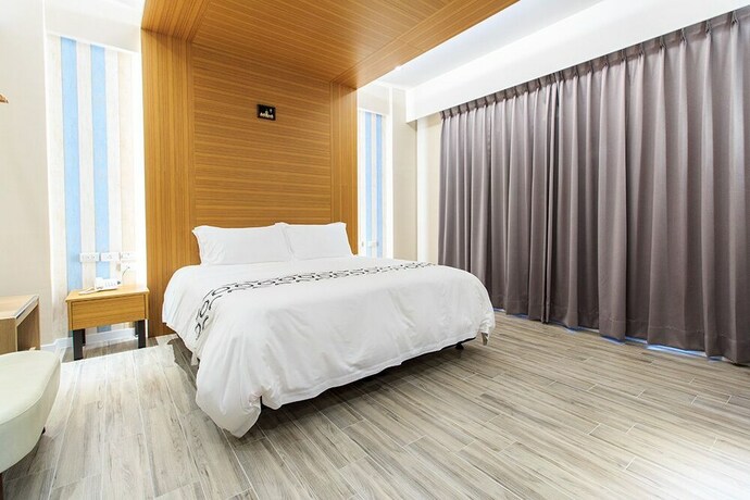 Imagen de la habitación del Hotel Urban Oasis Inn. Foto 18