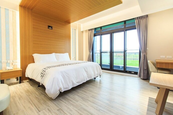 Imagen de la habitación del Hotel Urban Oasis Inn. Foto 19