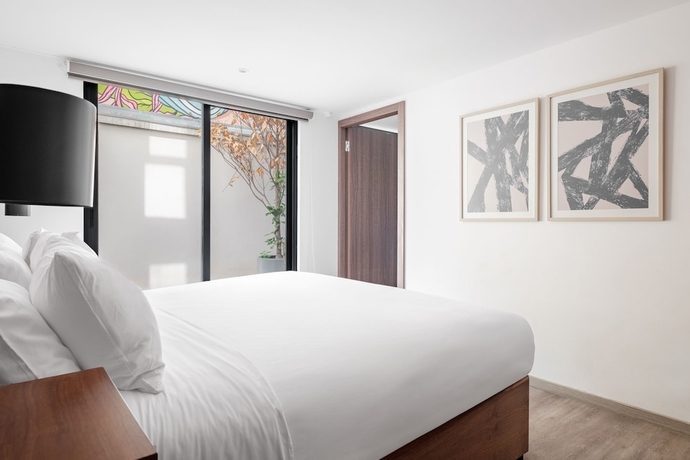 Imagen de la habitación del Hotel Urban Reforma Mexico City by Lumina. Foto 11