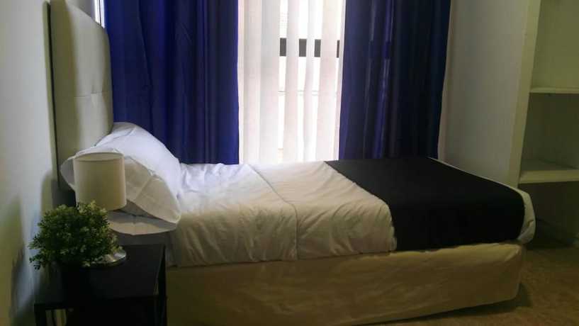 Imagen de la habitación del Hotel Urban Rooms Alicante. Foto 7