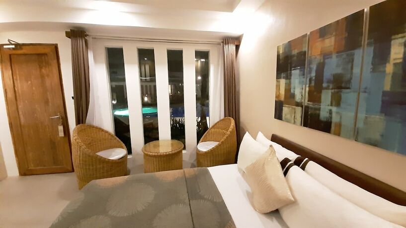 Imagen de la habitación del Hotel Urban Sands Iloilo Hotel. Foto 11