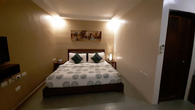 Imagen de la habitación del Hotel Urban Sands Iloilo Hotel. Foto 13