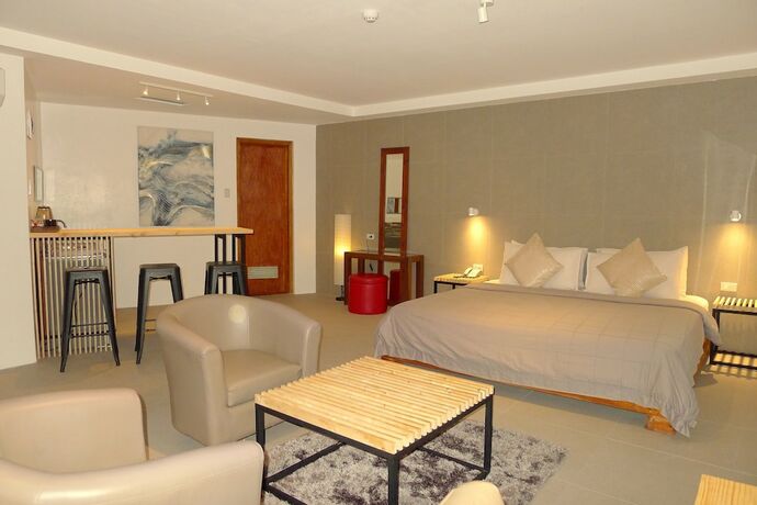 Imagen de la habitación del Hotel Urban Sands Iloilo Hotel. Foto 18