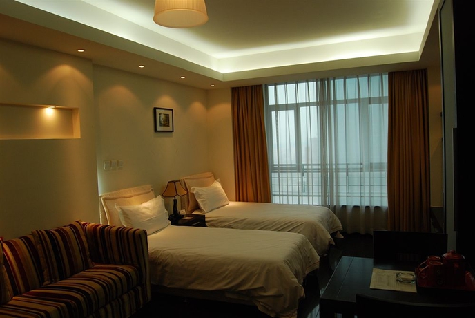 Imagen de la habitación del Hotel Urban Shanghai. Foto 2