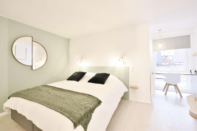 Imagen de la habitación del Hotel Urban Walls. Foto 9