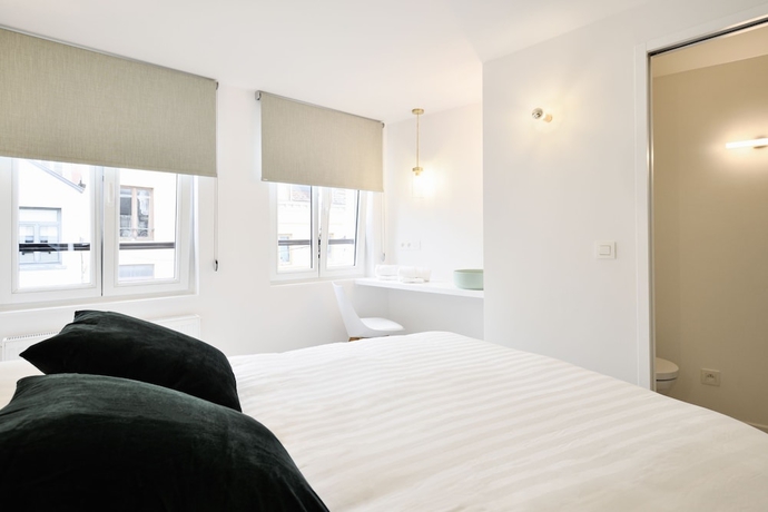 Imagen de la habitación del Hotel Urban Walls. Foto 11