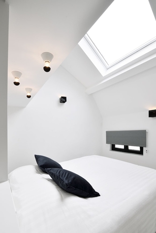 Imagen de la habitación del Hotel Urban Walls. Foto 16