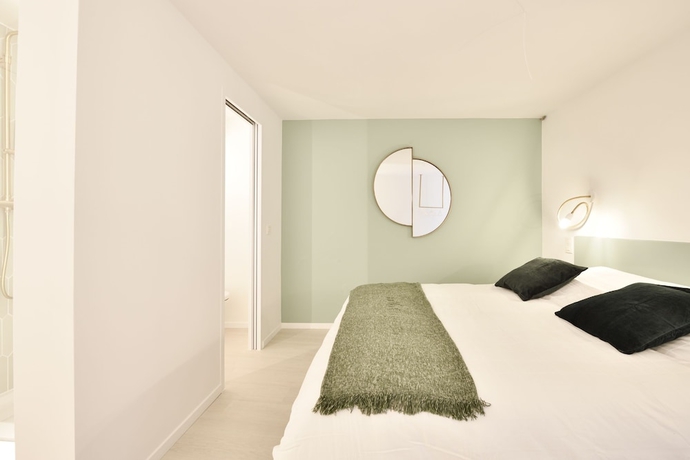 Imagen de la habitación del Hotel Urban Walls. Foto 19