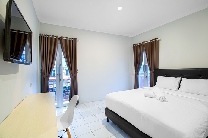 Imagen de la habitación del Hotel Urban24 Syariah Depok. Foto 4