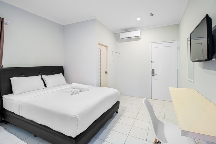 Imagen de la habitación del Hotel Urban24 Syariah Depok. Foto 5