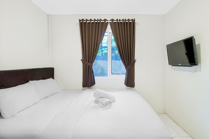 Imagen de la habitación del Hotel Urban24 Syariah Depok. Foto 7