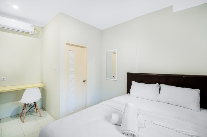Imagen de la habitación del Hotel Urban24 Syariah Depok. Foto 8
