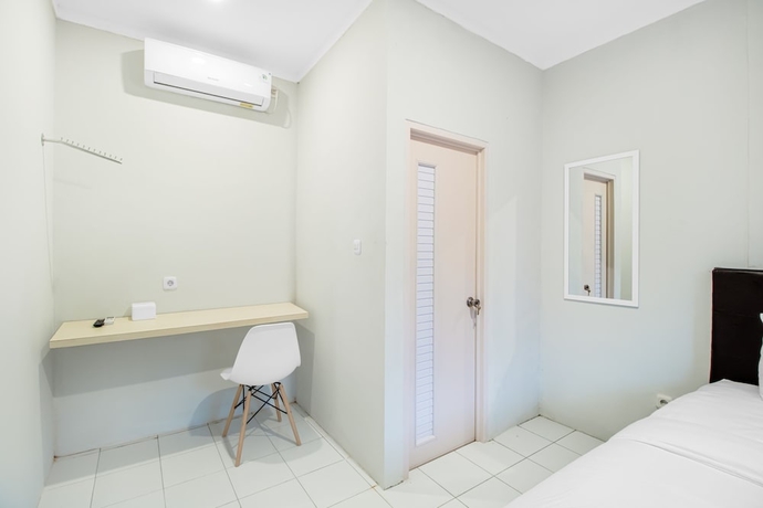 Imagen de la habitación del Hotel Urban24 Syariah Depok. Foto 9