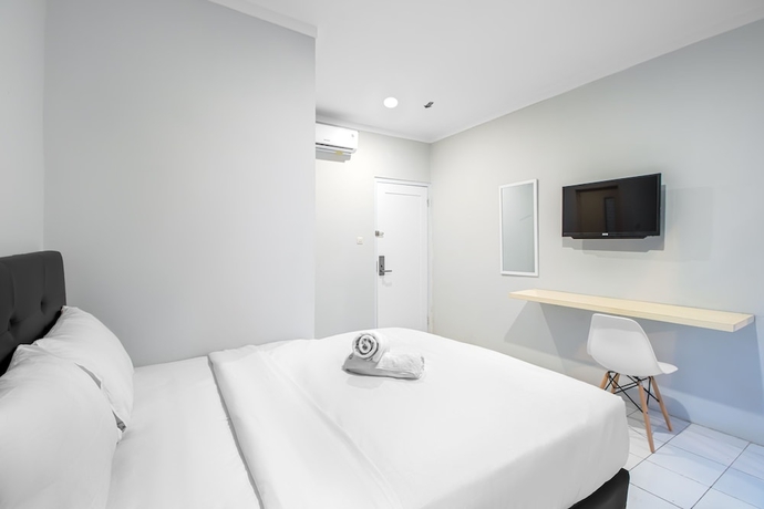 Imagen de la habitación del Hotel Urban24 Syariah Depok. Foto 11