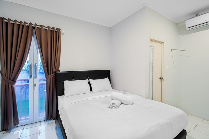 Imagen de la habitación del Hotel Urban24 Syariah Depok. Foto 12