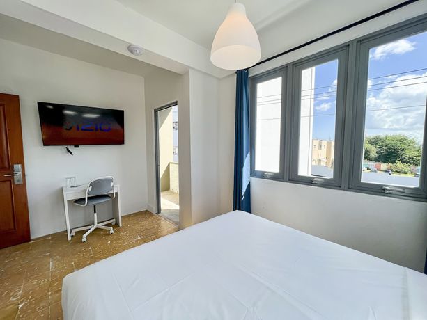 Imagen de la habitación del Hotel Urbana. Foto 16