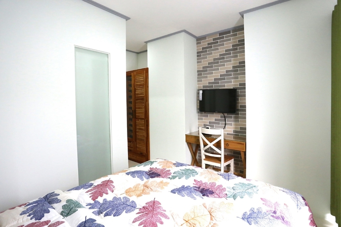 Imagen de la habitación del Hotel Urbanest Inn House Tb Simatupang. Foto 9