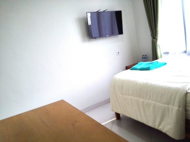 Imagen de la habitación del Hotel Urbanest Inn House Tb Simatupang. Foto 10