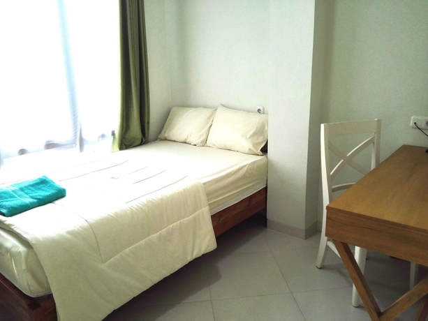 Imagen de la habitación del Hotel Urbanest Inn House Tb Simatupang. Foto 15