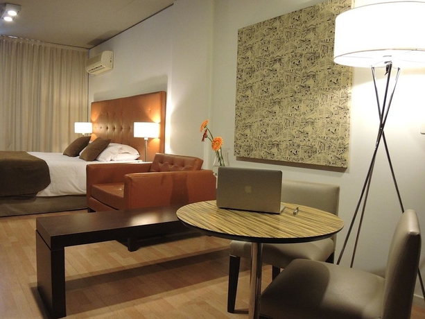 Imagen de la habitación del Hotel Urbanica Suites. Foto 10