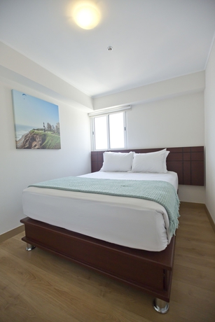 Imagen de la habitación del Hotel Urbano Apartments Miraflores Pardo. Foto 7
