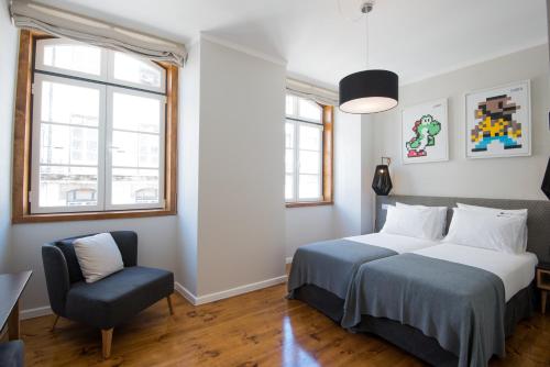 Imagen de la habitación del Hotel Urbano FLH Hotels Lisboa. Foto 9