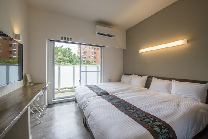 Imagen de la habitación del Hotel Urbansea 2 Matsuo. Foto 19