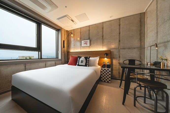 Imagen de la habitación del Hotel Urbanstay Boutique Nampo. Foto 18