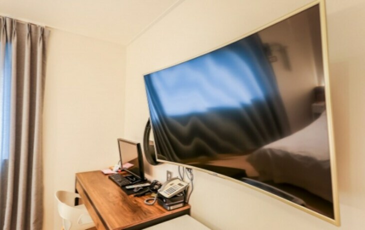Imagen de la habitación del Hotel Urbanstay. Foto 22
