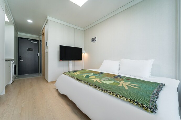 Imagen de la habitación del Hotel Urbanstay Myeongdong. Foto 23
