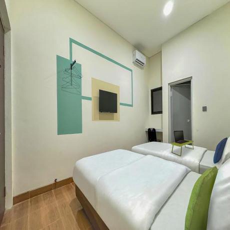 Imagen de la habitación del Hotel Urbanview Aloevera Pontianak. Foto 18