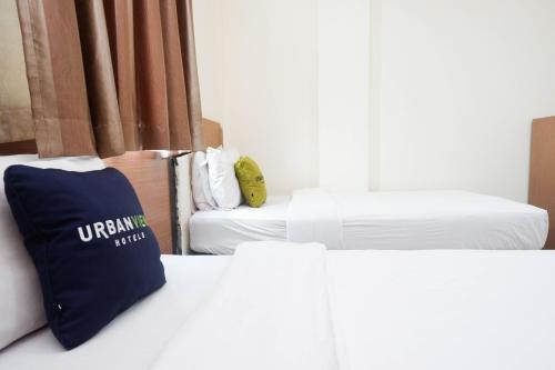 Imagen de la habitación del Hotel Urbanview Capital Makassar. Foto 17