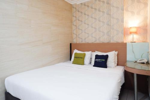 Imagen de la habitación del Hotel Urbanview Capital Makassar. Foto 20