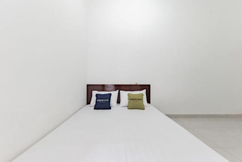 Imagen de la habitación del Hotel Urbanview Damai Residence Sutawinangun. Foto 17