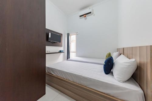 Imagen general del Hotel Urbanview Damai Residence Sutawinangun. Foto 15