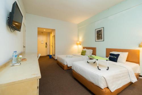 Imagen de la habitación del Hotel Urbanview Kebayoran Baru Blok S. Foto 18