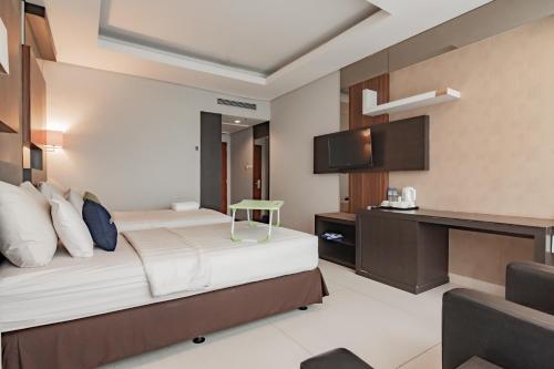 Imagen de la habitación del Hotel Urbanview Newton Riau Bandung by RedDoorz. Foto 15