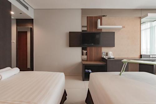 Imagen general del Hotel Urbanview Newton Riau Bandung by RedDoorz. Foto 9