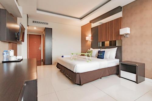 Imagen de la habitación del Hotel Urbanview Newton Riau Bandung by RedDoorz. Foto 17