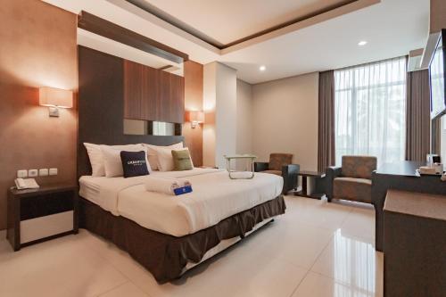 Imagen de la habitación del Hotel Urbanview Newton Riau Bandung by RedDoorz. Foto 18